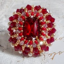 Ruby ring embroidered with a bohemian crystal cabochon